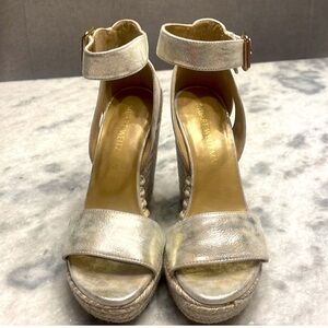 Beautiful pair of Stuart Weitzman sandals.   Gold.